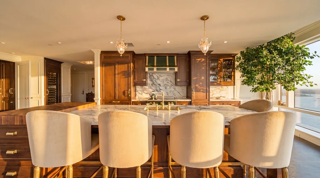 The Visionaire — kitchen island and upholstered counter stools